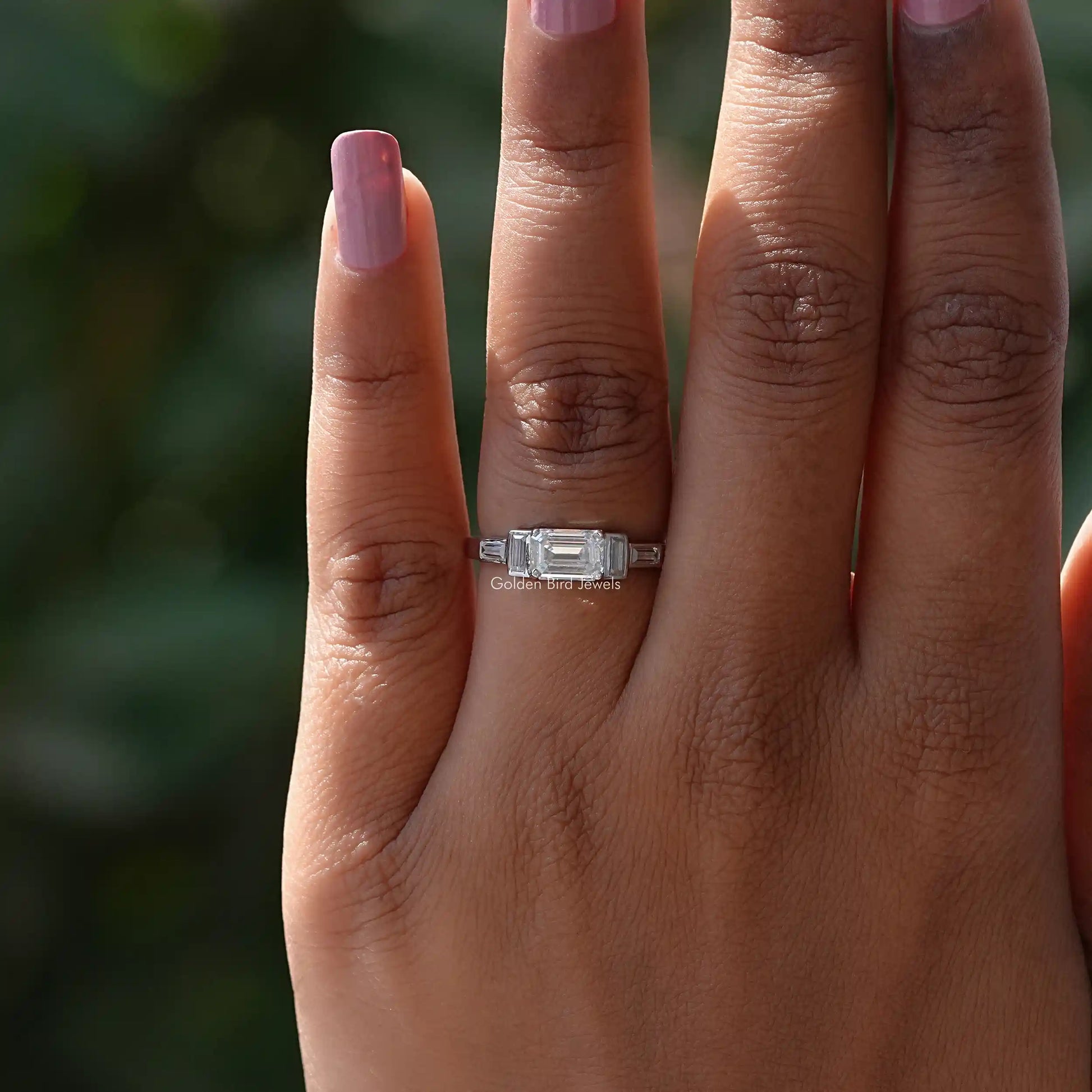 Detailed View Of Emerald Cut Moissanite Five Stone Ring In White Gold