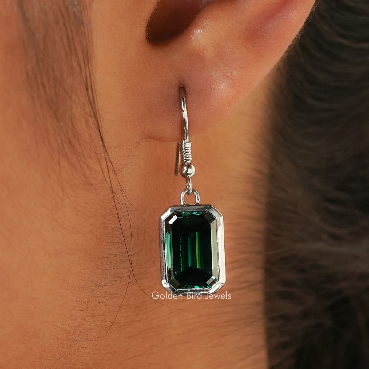Dark green emerald-cut moissanite dangle drop earrings with hinged hoop closures
