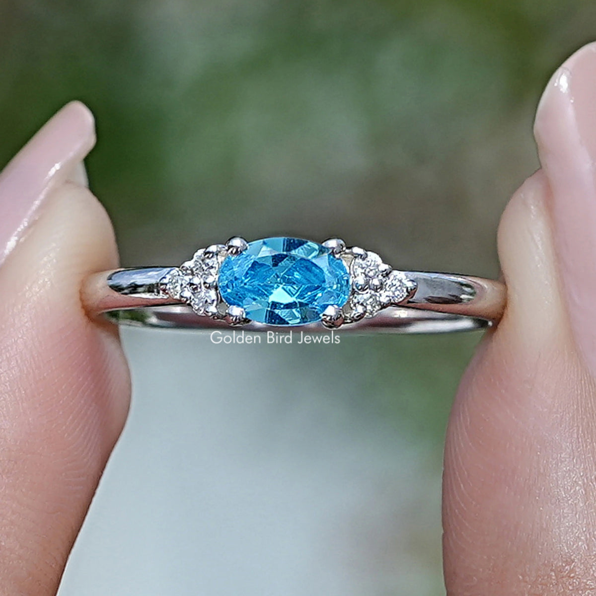 East West Aqua Marine Oval Cut Gemstone Ring