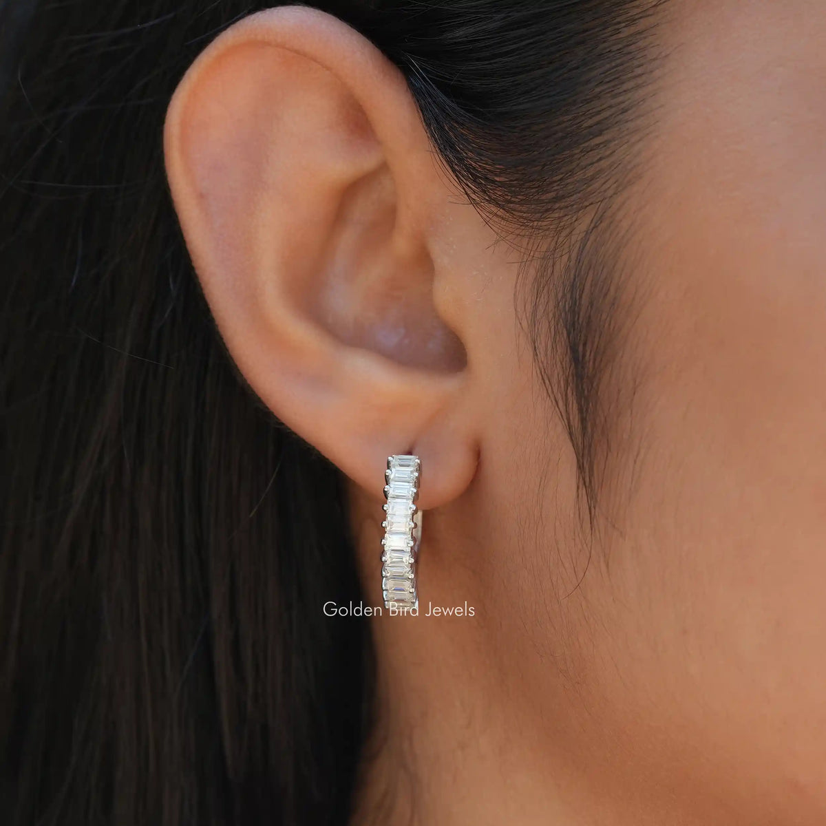 [In ear front view of baguette cut earrings in 14k white gold]-[Golden Bird Jewels]