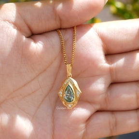 Front view of pear and round cut moissanite pendant