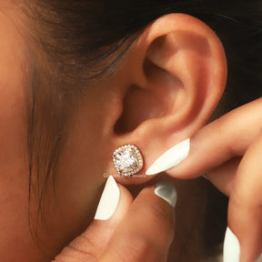 Front view of round cut  side stones moissanite stud earrings