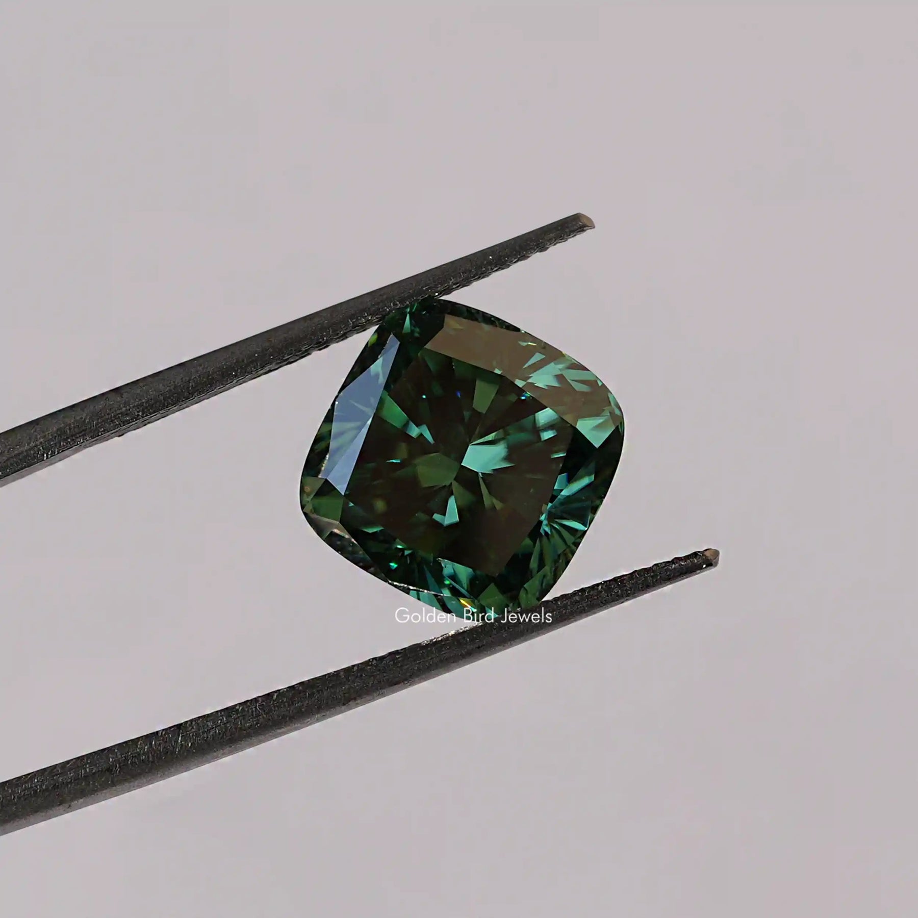 [This dark green cushion cut loose stone crafted with vs clarity]-[Golden Bird Jewels]