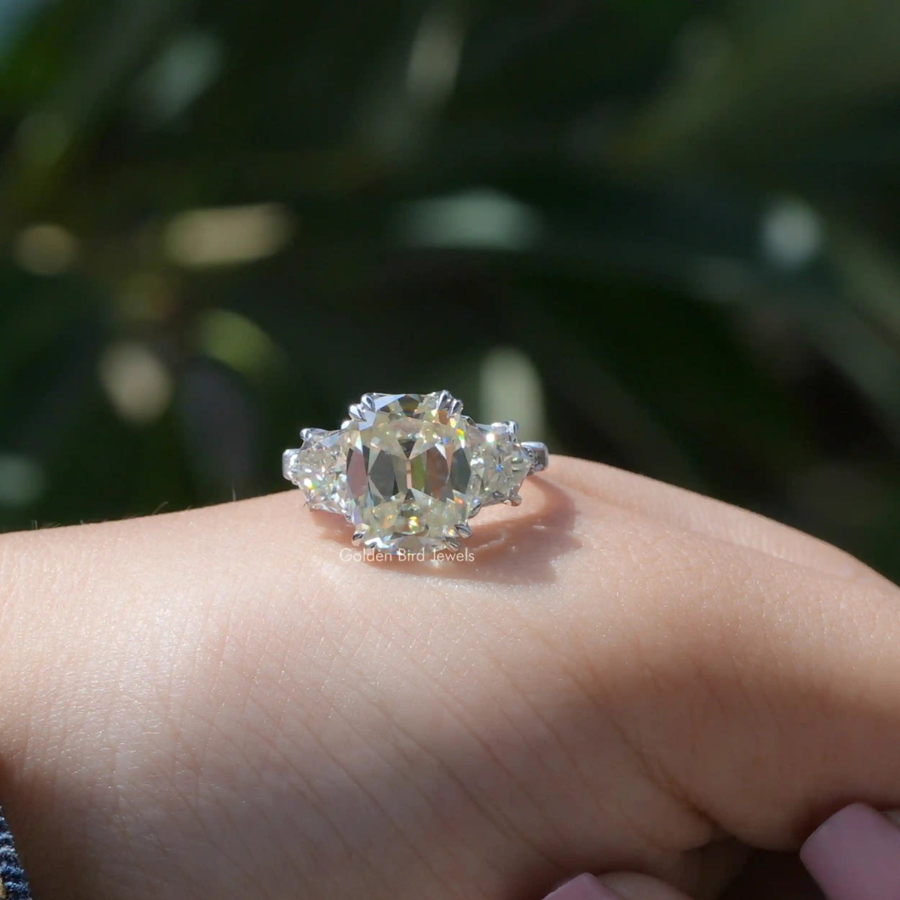 [Front view of cushion cut three stone moissanite ring]-[Golden Bird Jewels]