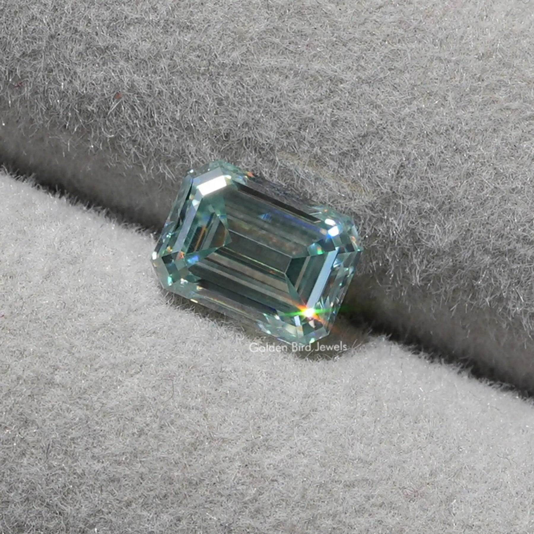 [Front view of emerald cut loose moissanite]-[Golden Bird Jewels]