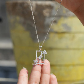 Front view of emerald cut moissanite pendant