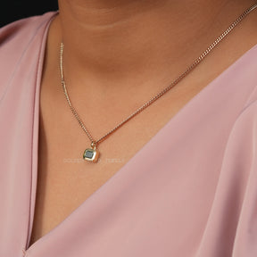 [Side view of emerald cut pendant made of green emerald]-[Golden Bird Jewels]
