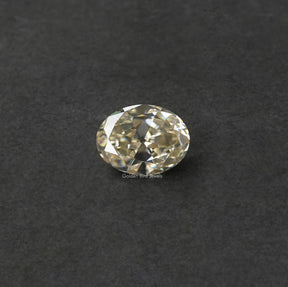 [This off oval cut moissanite made of off white color and VVS clarity]-[Golden Bird Jewels]