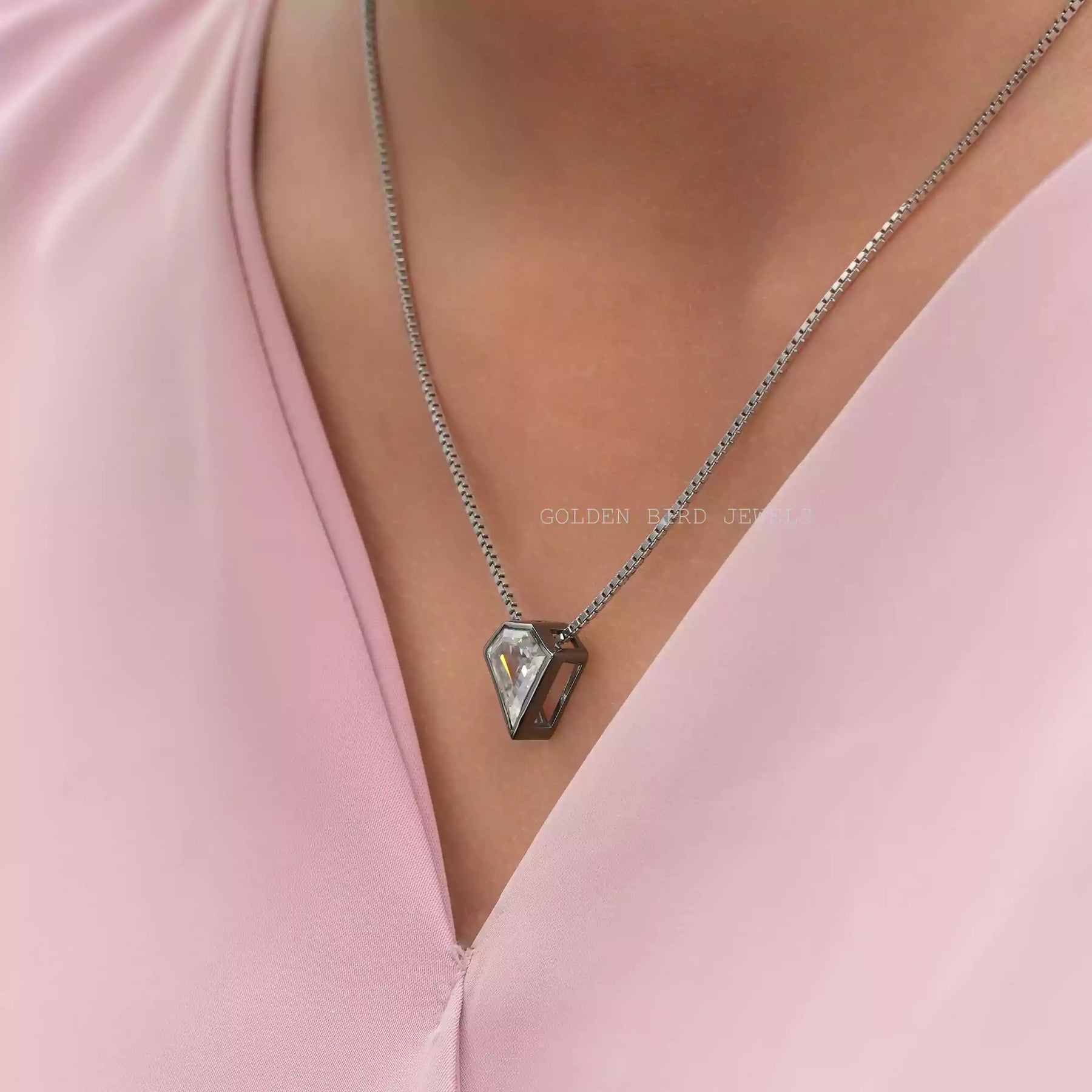 [In neck front view of pentagon cut moissanite pendant set in bezel setting]-[Golden Bird Jewels]