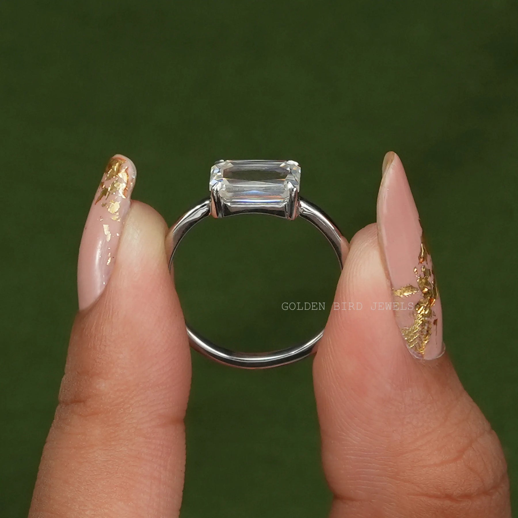 [In two finger front view of portrait cut radiant solitaire ring made of prong setting and white gold]-[Golden Bird Jewels]