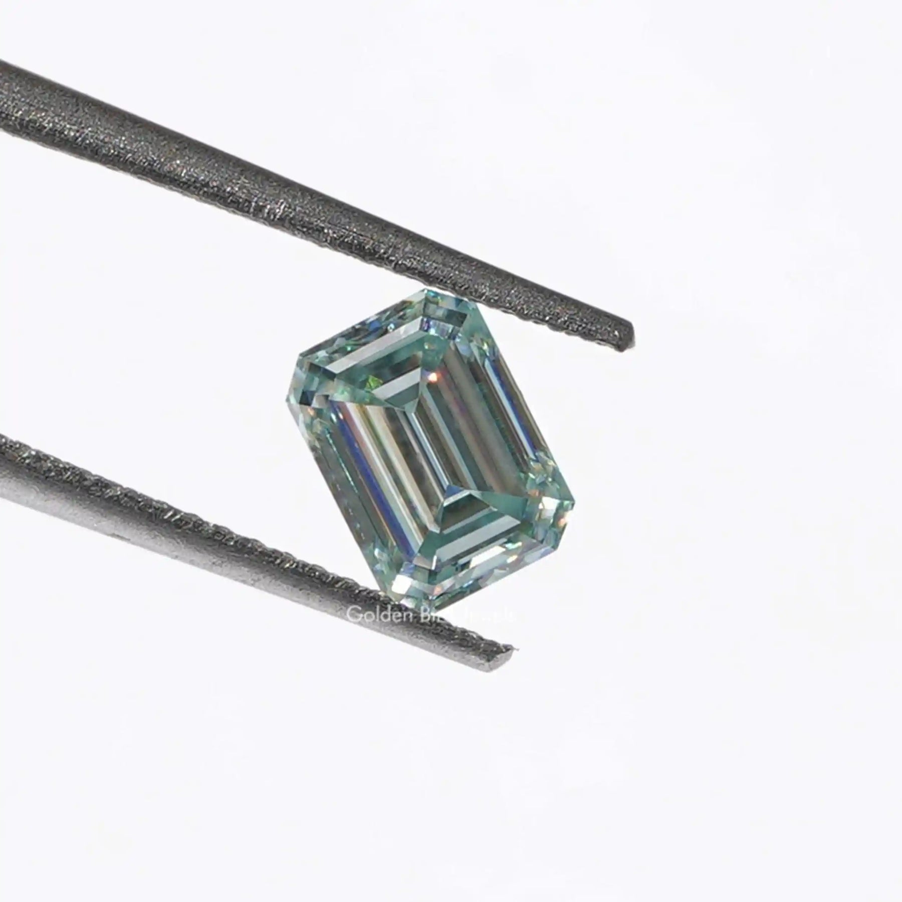 [This aqua blue emerald cut loose stone made of vs clarity ]-[Golden Bird Jewels]