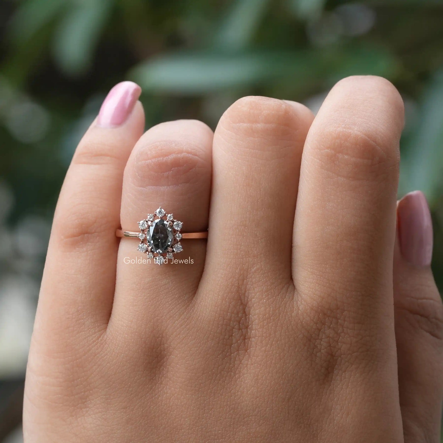 [Gray oval cut engagement ring crafted with prongs and round cut side stones]-[Golden Bird Jewels]