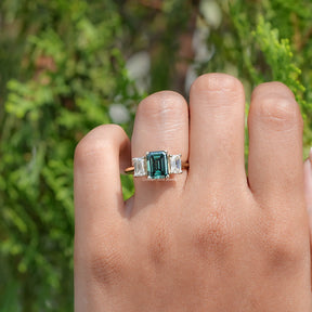 In Finger view of Emerald Moissanite 3 Stone engagement ring 