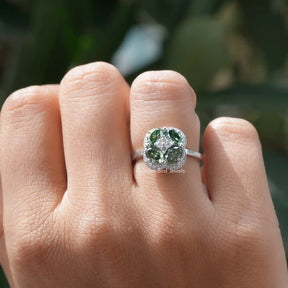 [In finger front view of green oval cut moissanite engagement ring crafted with prong setting]-[Golden Bird Jewels]