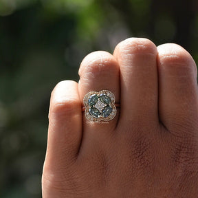 View of Green Oval Cut Moissanite Engagement Ring In finger
