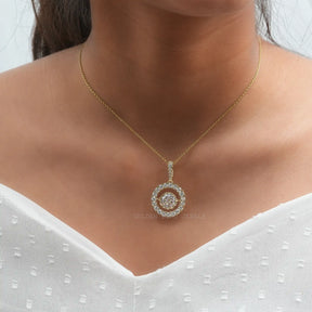 [In neck front view of round cut moissanite pendant in 14k yellow gold]-[Golden Bird Jewels]