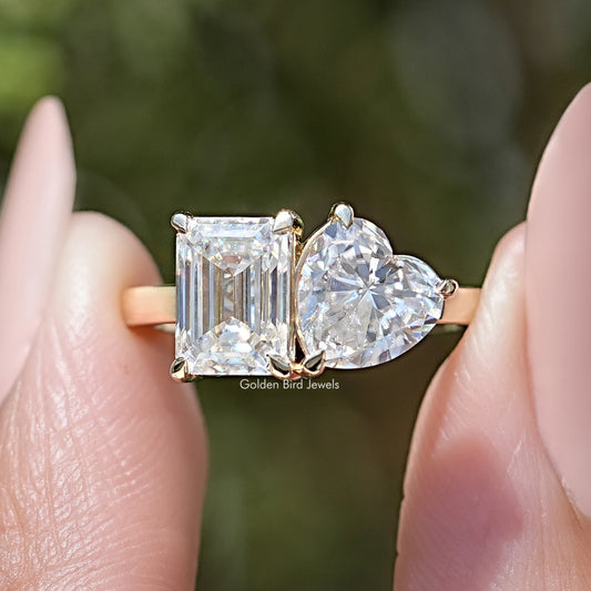 Toi et moi ring with emerald-cut and heart-shaped moissanite stones, silver-tone.
