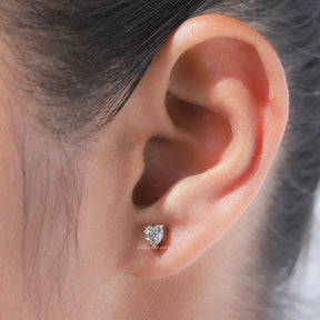 In ear view of heart cut cluster moissanite earrings