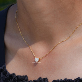 In neck view of heart cut diamond halo pendant