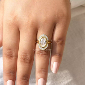 [In finger view of oval cut engagement ring]-[Golden Bird Jewels]