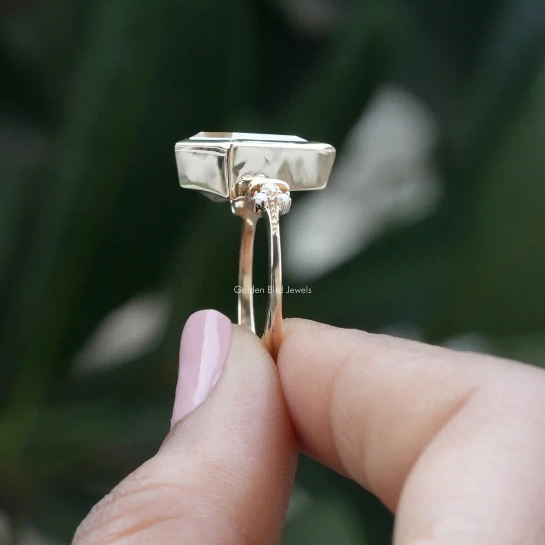 [Side view of kite shaped moissanite engagement ring in 14k yellow gold]-[Golden Bird Jewels]