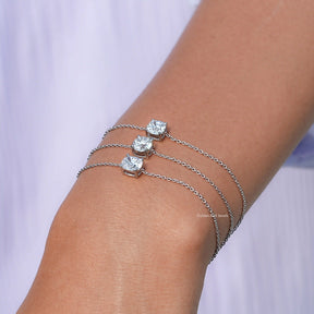 In hand showing view of Lab multi shaped  bracelet