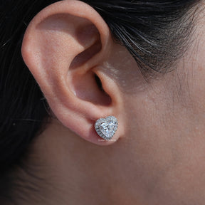 Front view of heart cut shaped diamond stud earrings In White Gold