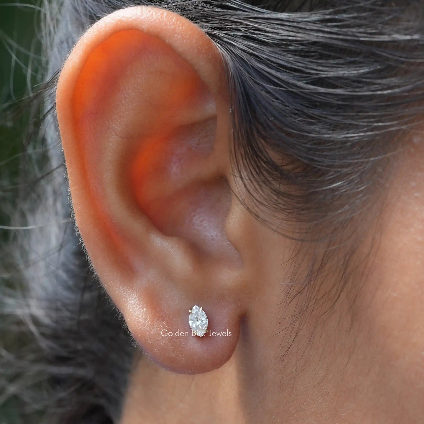 In ear front view of marquise cut lab grown earrings