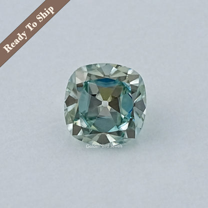 Light blue cushion-cut moissanite gemstone, faceted oval