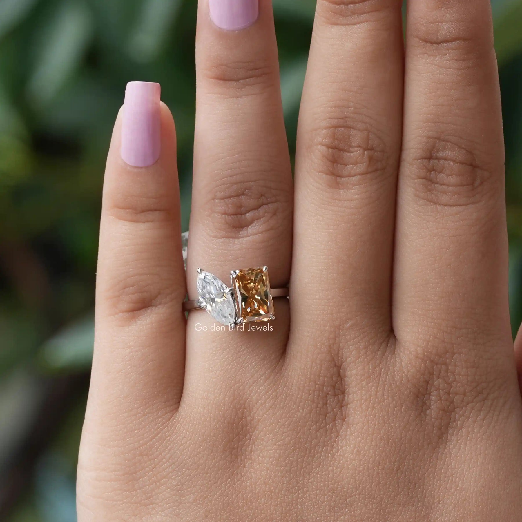 [In finger front view of marquise and radiant cut toi et moi moissanite ring]-[Golden Bird Jewels]