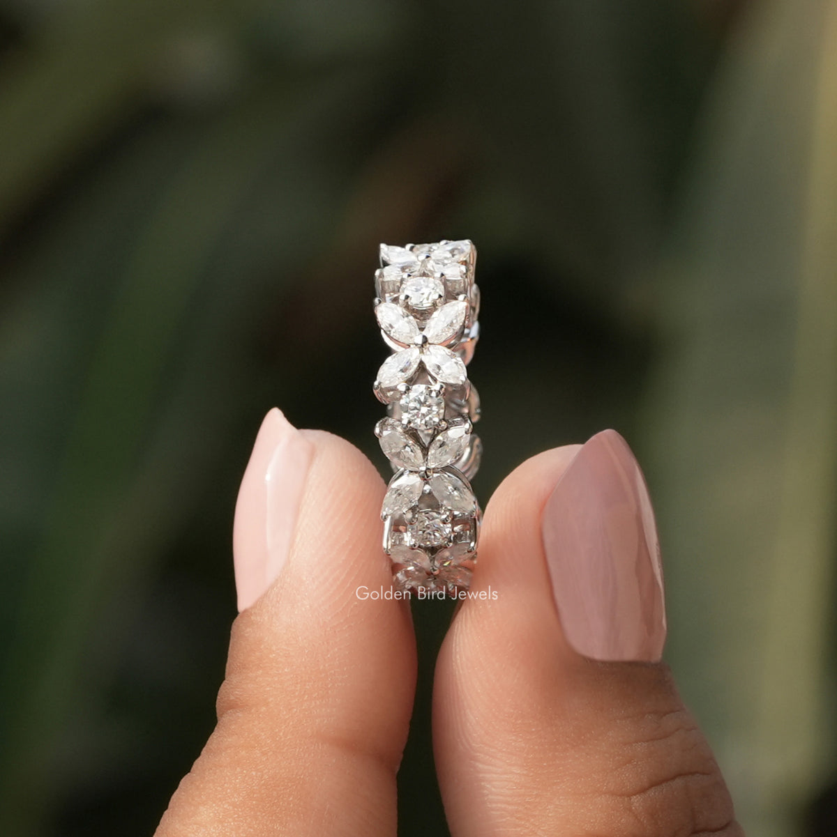 [In two finger side view of marquise and round cut moissanite wedding band crafted with white gold]-[Golden Bird Jewels]