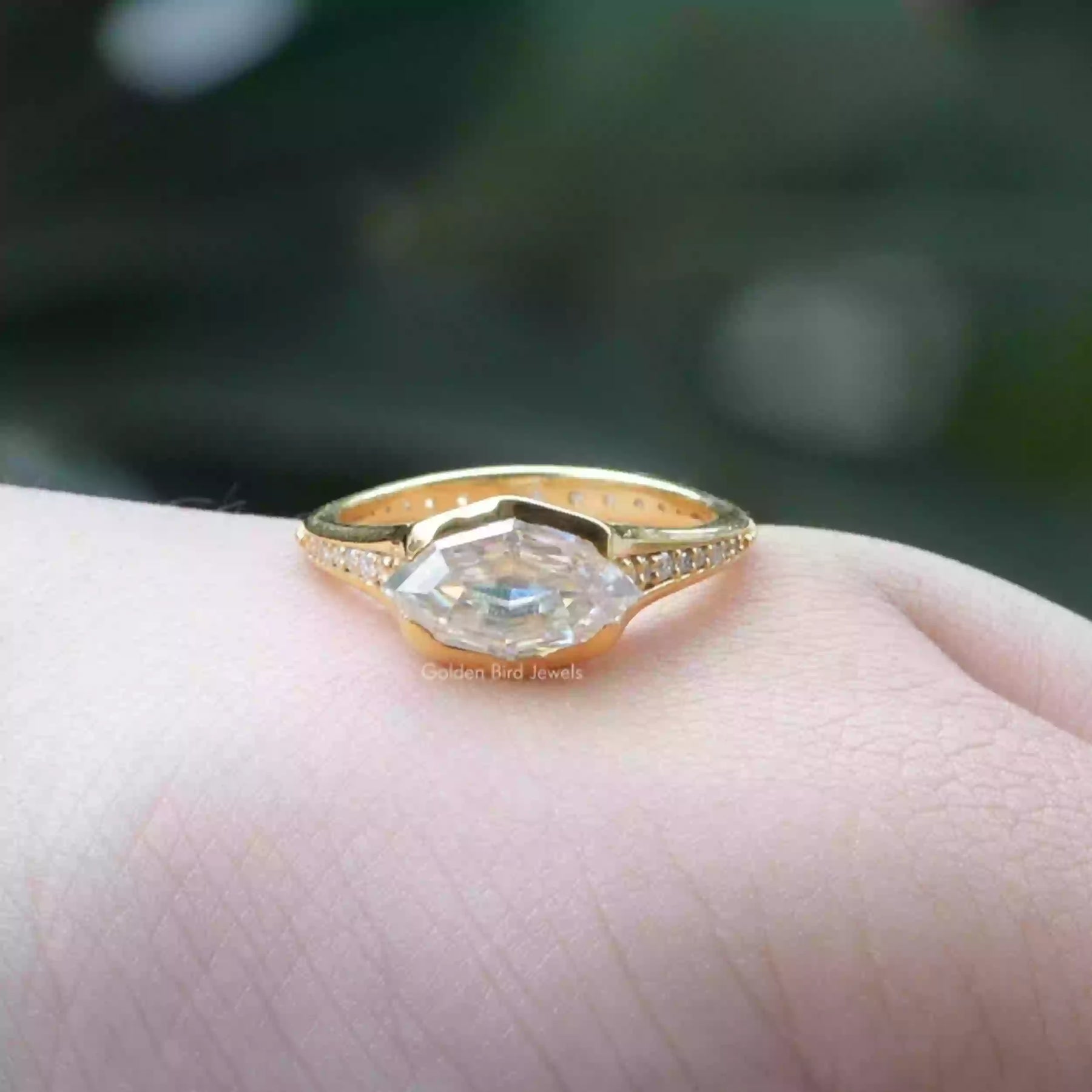[Front view of marquise cut moissanite ring in 14k yellow gold]-[Golden Bird Jewels]