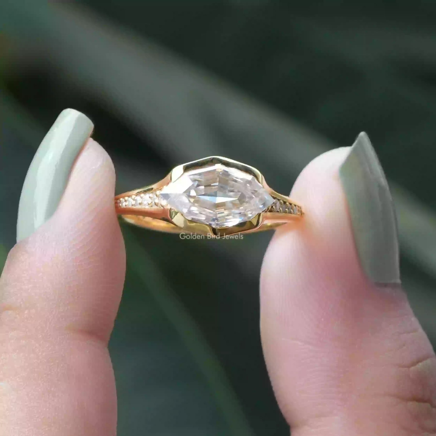 [In two finger front view of step cut marquise wedding ring]-[Golden Bird Jewels]