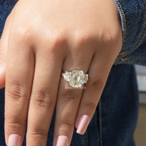 Cushion Cut Three Stone Moissanite Ring In finger