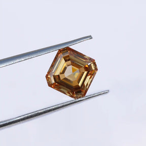 Twijer holding On the Asscher Cut Moissanite Loose Stone