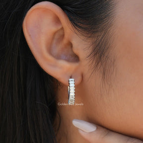 [In ear front view of baguette cut moissanite earrings]-[Golden Bird Jewels]