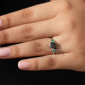 Close-Up View of Moissanite Kite And Round Cut Accent Stone Ring In Yellow Gold