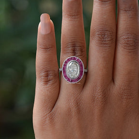 Detailed View Of Oval And Tapper Baguette Cut Engagement Ring In White Gold