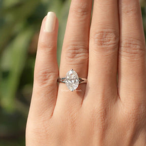 Oval Cut Hidden Halo Moissanite Ring In finger