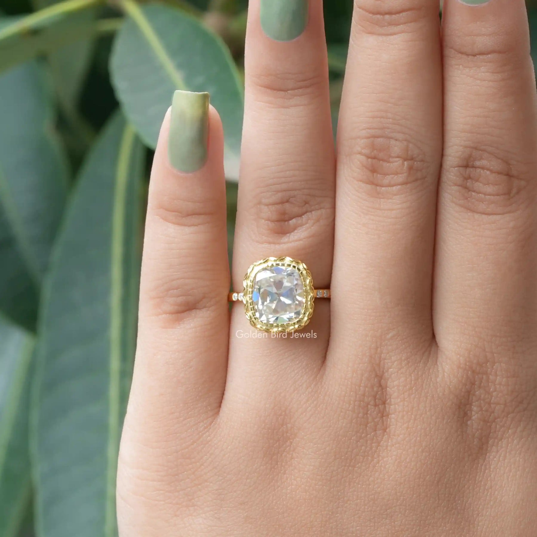 [In finger front view of cushion cut moissanite bezel set ring]-[Golden Bird Jewels]