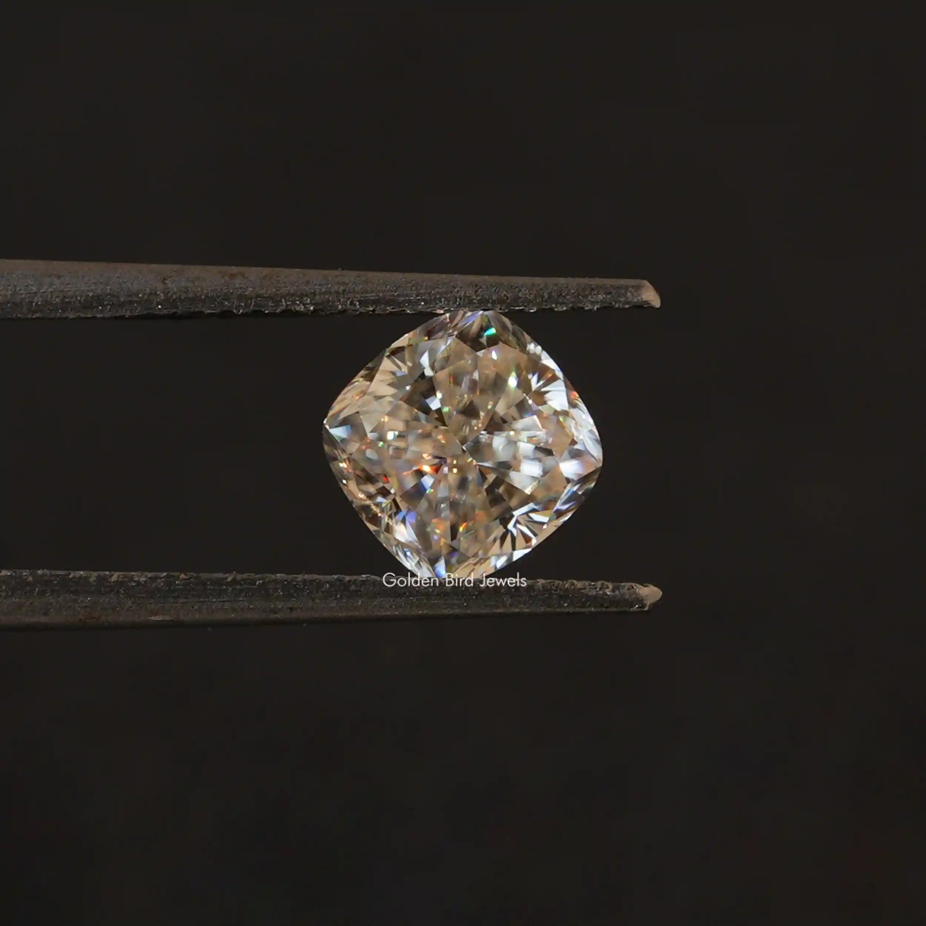 [Front view of near colorless cushion cut loose moissanite]-[Golden Bird Jewels]