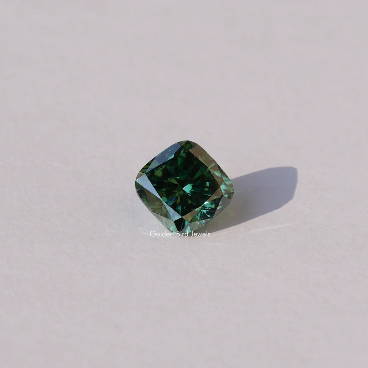 [Front view of dark green cushion cut loose moissanite]-[Golden Bird Jewels]