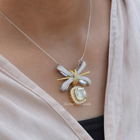 Side view of cushion cut pendant In white Gold
