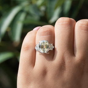 View of Moissanite Cushion Cut Three Stone Ring In finger