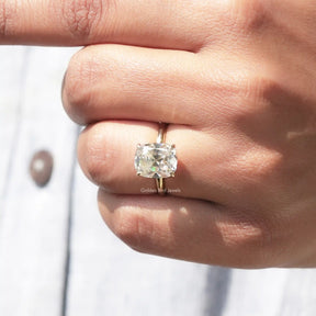 Close-Up View of Cushion Cut Moissanite Engagement Ring In Yellow Gold