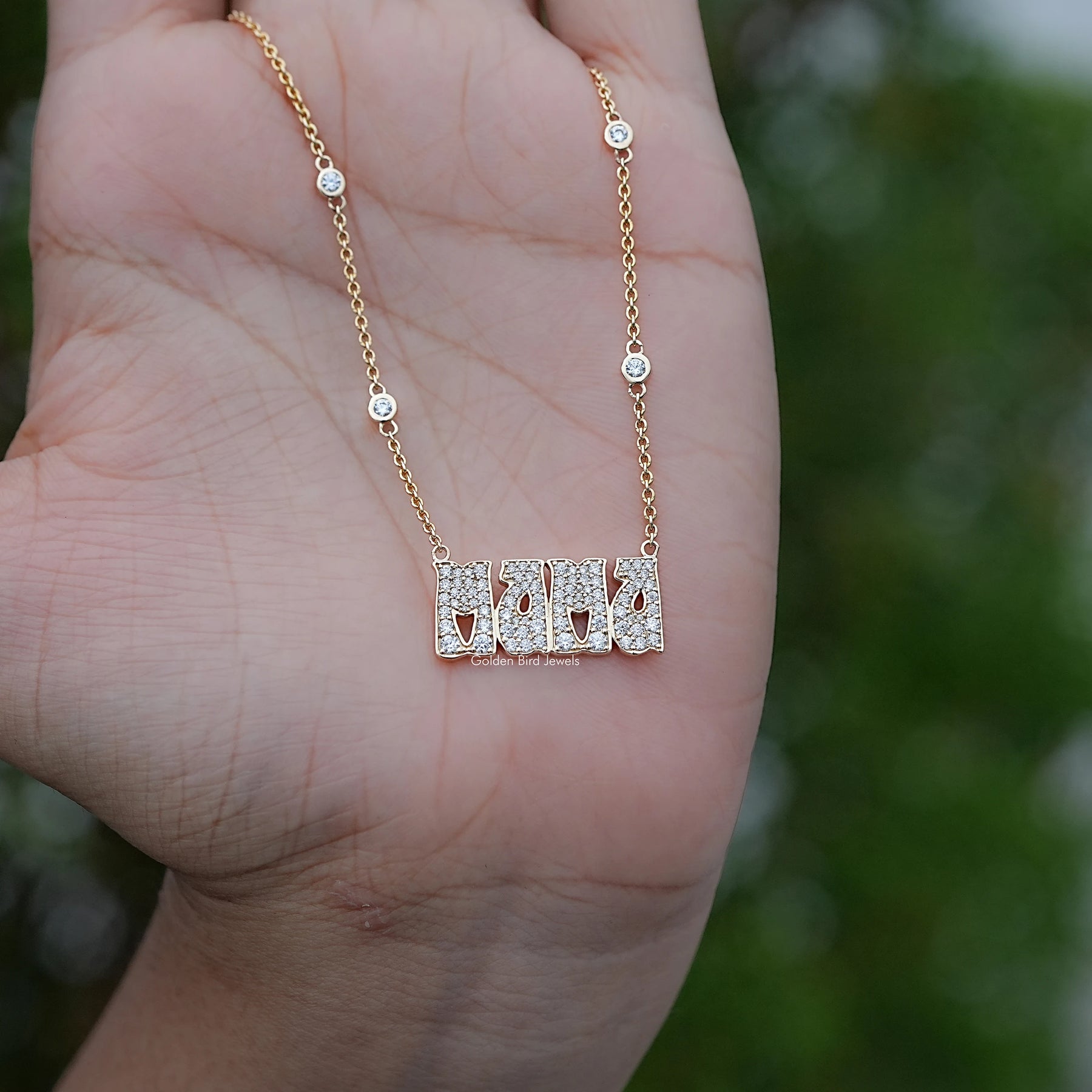 In-Hand View of Round Cut Moissanite Letter Necklace