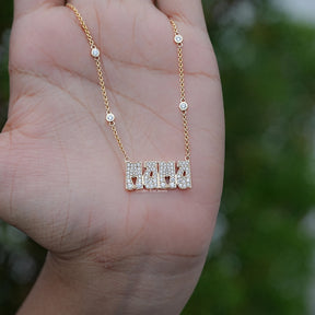In-Hand View of Round Cut Moissanite Letter Necklace