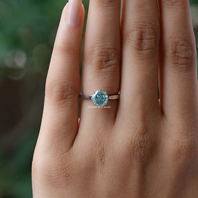 In finger front View of Moissanite Portuguese Round Cut Solitaire Ring