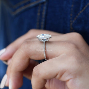 [Slightly folded finger side view of dutch marquise cut moissanite engagement ring]-[Golden Bird Jewels]