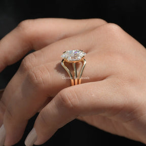 [In Finger side view of marquise cut moissanite ring set in 18k yellow gold]-[Golden Bird Jewels]